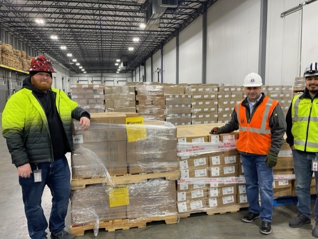 GCCA member US Cold Storage receiving the first shipment of pork to store for Operation BBQ Rescue.